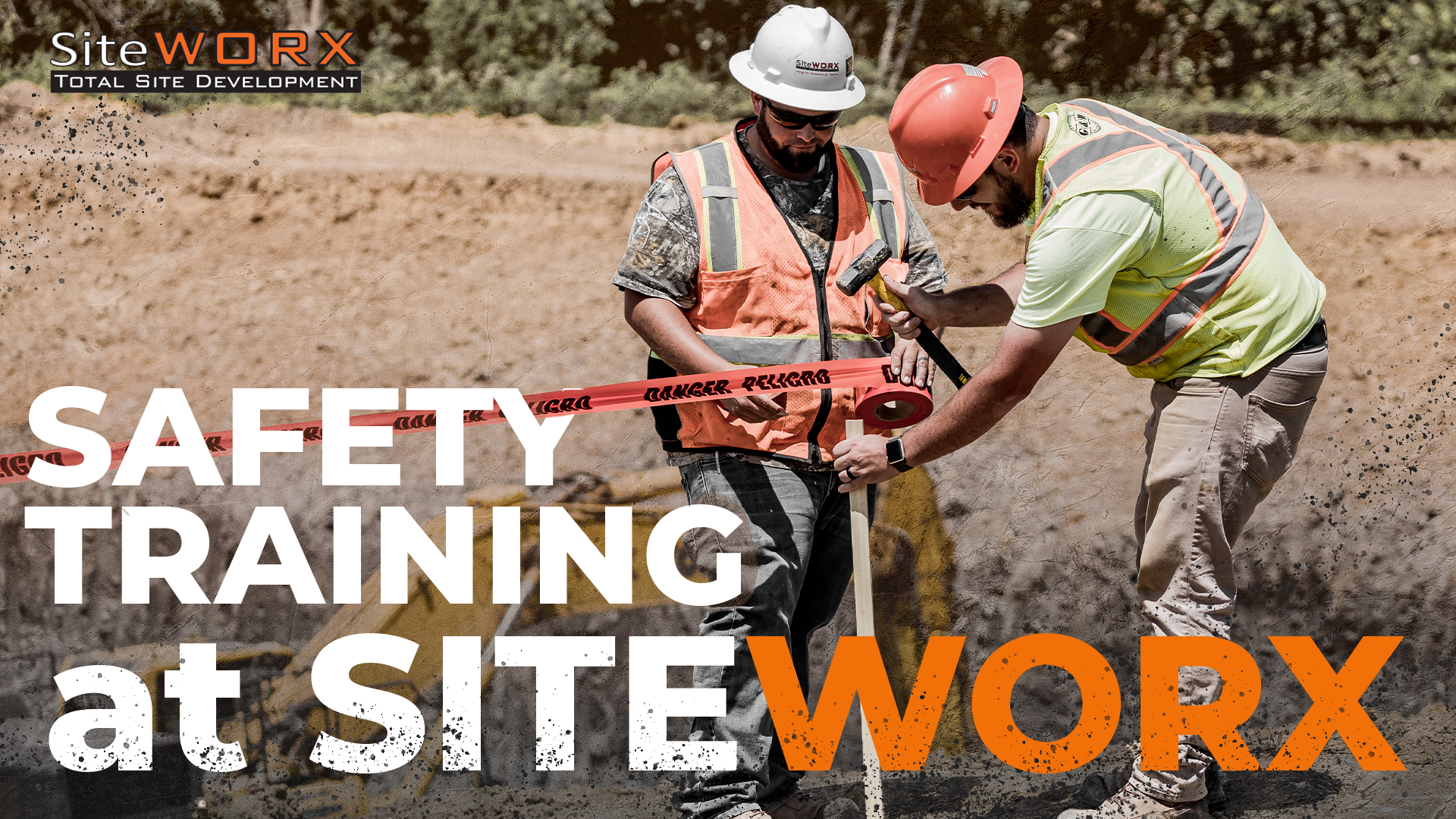 Two construction workers taping an area off with the text "Safety Training at SiteWORX"